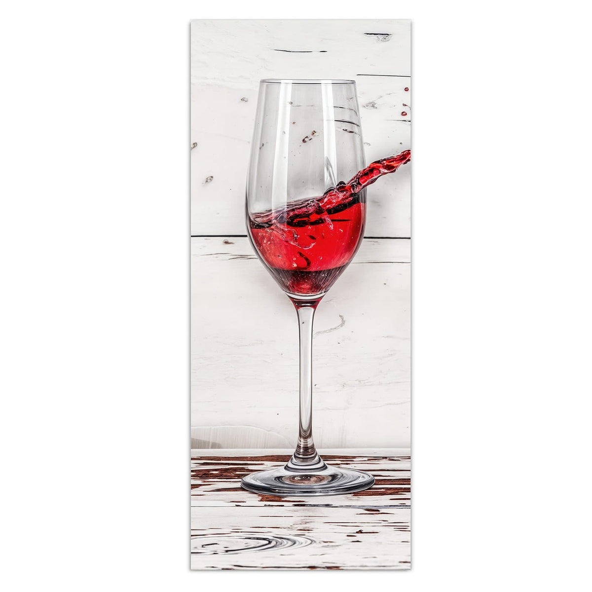 Wandbild - Gekipptes Rotweinglas - Hochformat – Rotwein schwappt aus gekipptem Glas