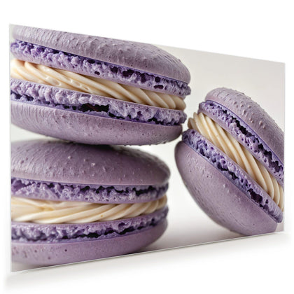 Wandbild mit dem Motiv Lila Macarons mit Creme