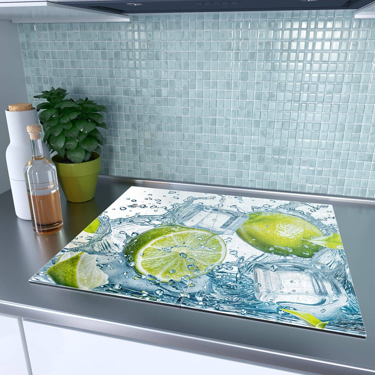 Herdabdeckplatte Limetten mit Eis – Limetten und Eis im Wasserspritzer