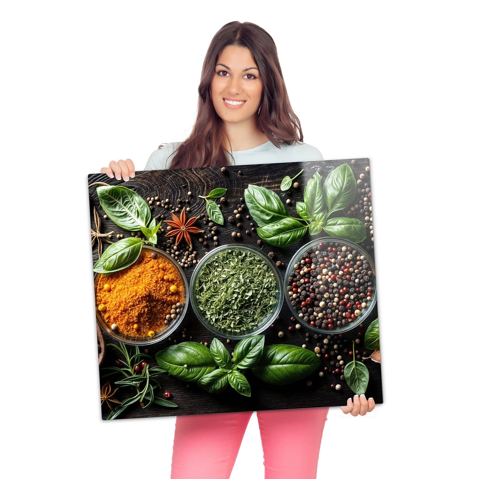 Abdeckplatte für Induktionsherd mit Gewürze Und Kräuter-Motiv wird zur Größendarstellung gehalten