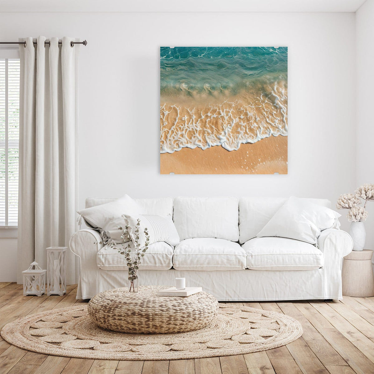 Glasbild Meeresschaum auf Sand an der Wand – Blick von oben auf türkises Wasser, dessen weißer Schaumsaum auf hellen Sand ausläuft