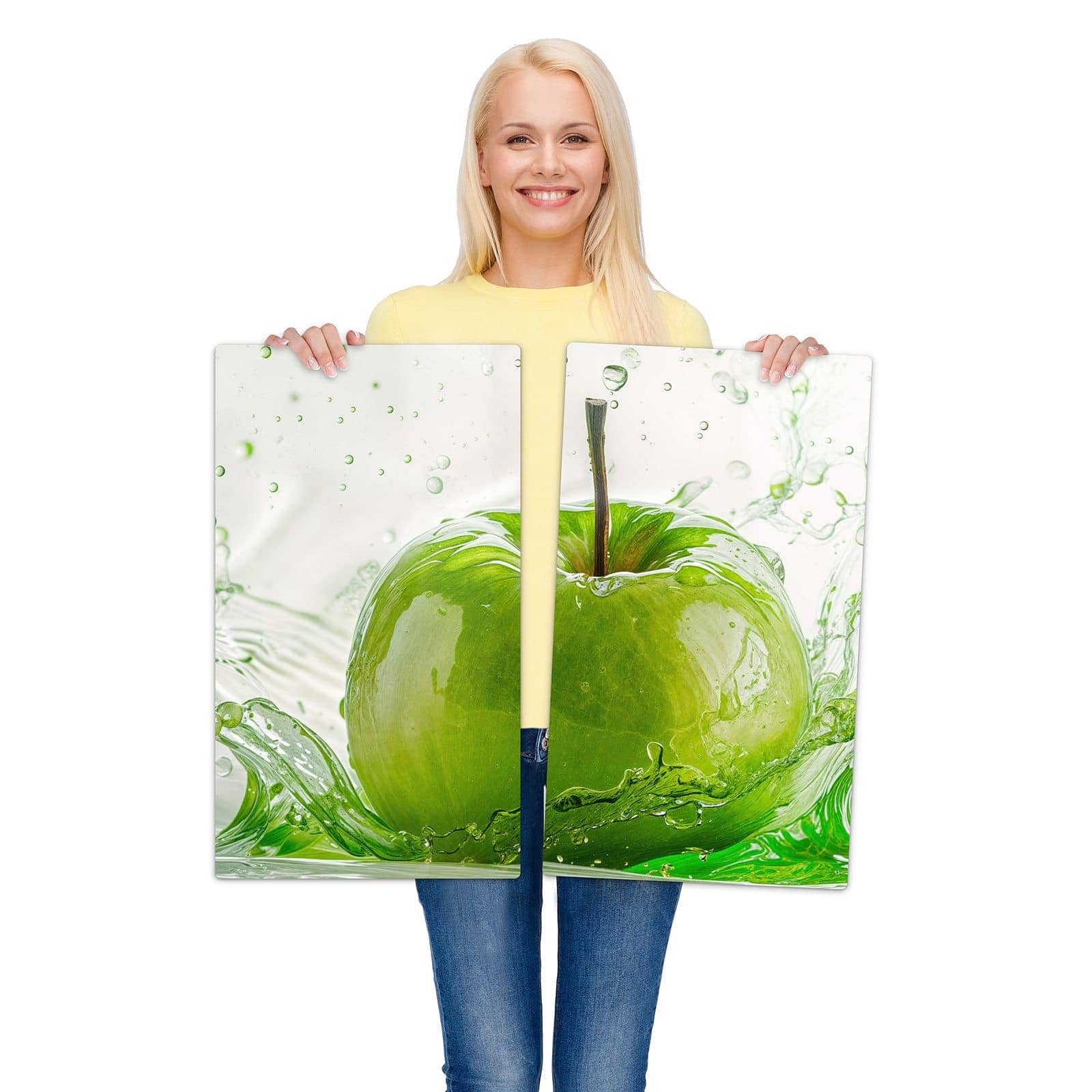 2-teilige Herdabdeckplatten aus Glas mit Apfel Spritzer-Motiv wird zur Größendarstellung gehalten