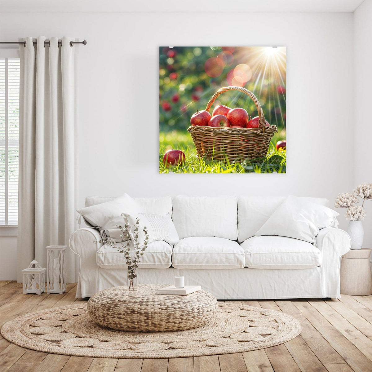 Glasbild Korb mit roten Äpfeln an der Wand – Weidenkorb voller roter Äpfel im Gras, Sonnenstrahlen durch die Bäume dahinter