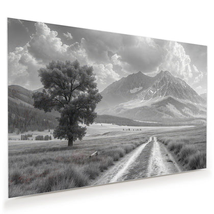 Wandbild mit dem Motiv Einsamer Baum vor Bergen