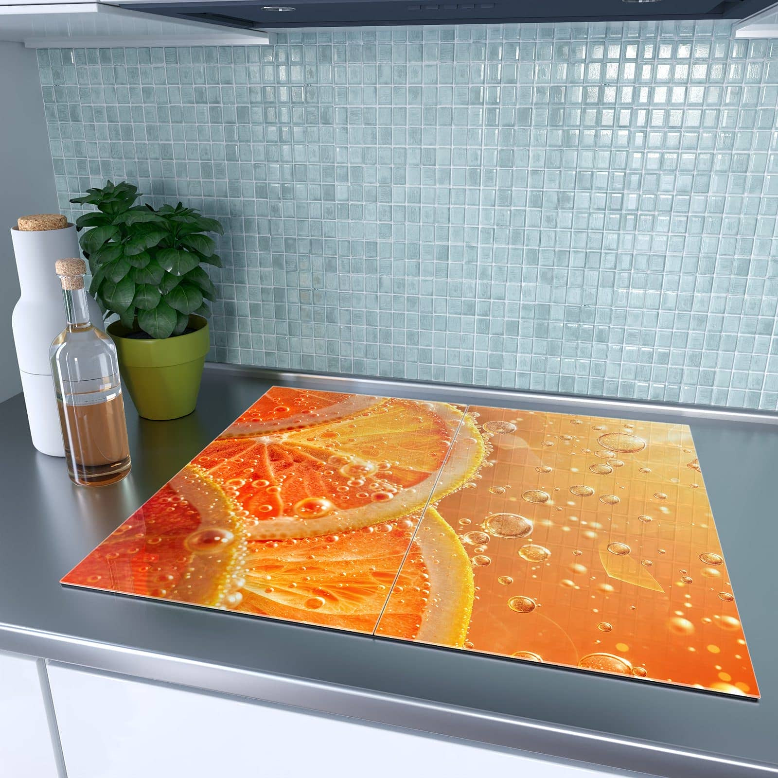 2-teilige Herdabdeckplatte mit Spritzige Orange-Motiv auf dem Ceranfeld