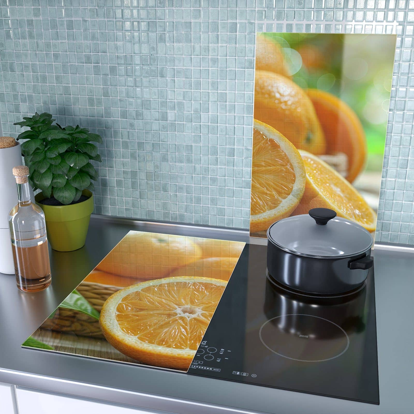 2-teilige Herdabdeckplatte mit Frische Orangen-Motiv als Spritzschutz hinter dem Kochfeld