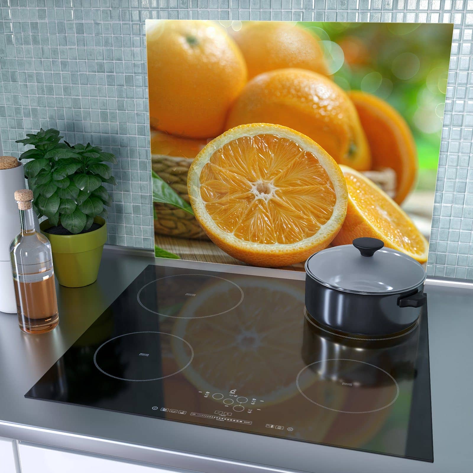 1-teilige Herdabdeckung für Induktionsfeld mit Frische Orangen-Motiv als Spritzschutz hinter dem Kochfeld