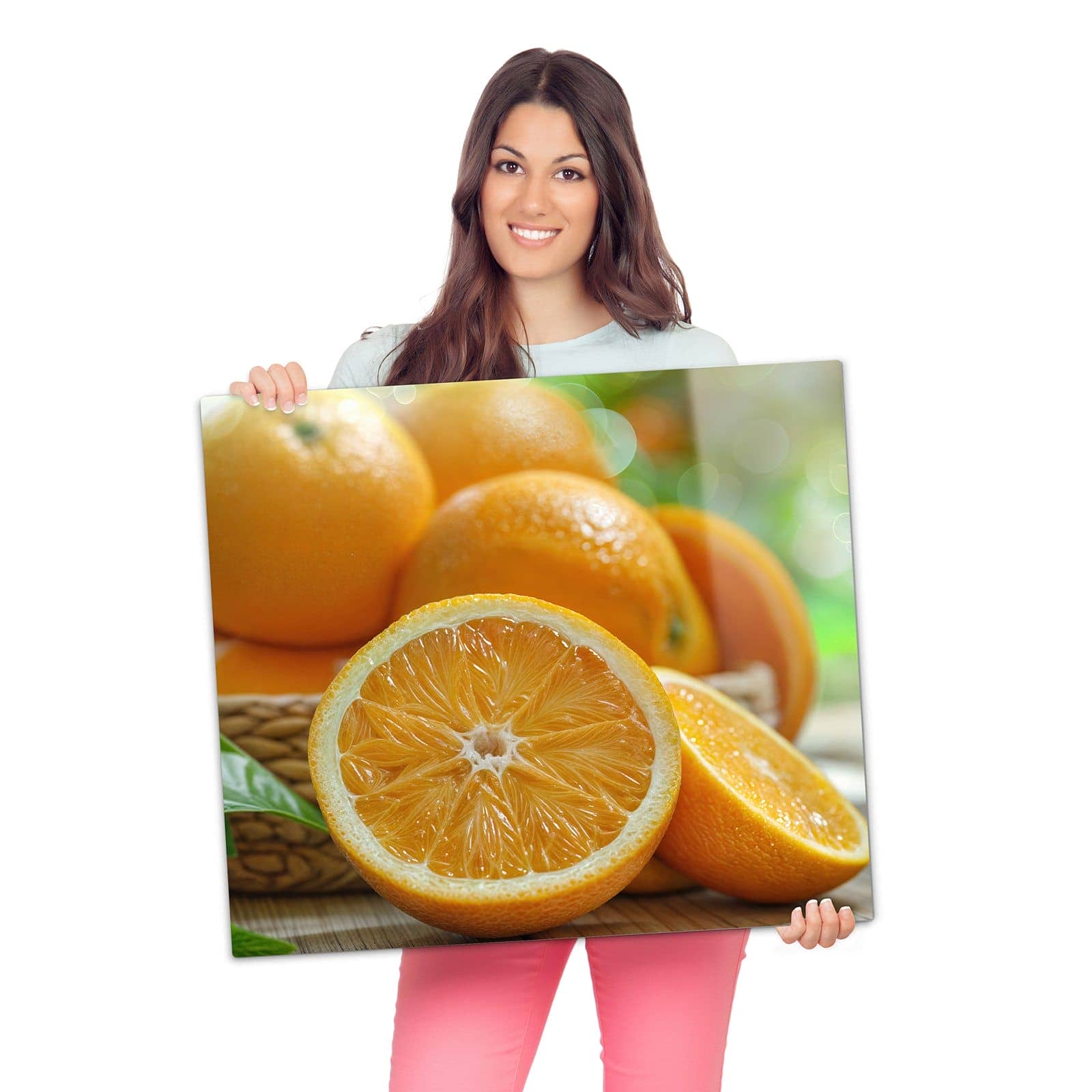 Glasabdeckplatte für Ceranfeld mit Frische Orangen-Motiv wird zur Größendarstellung gehalten