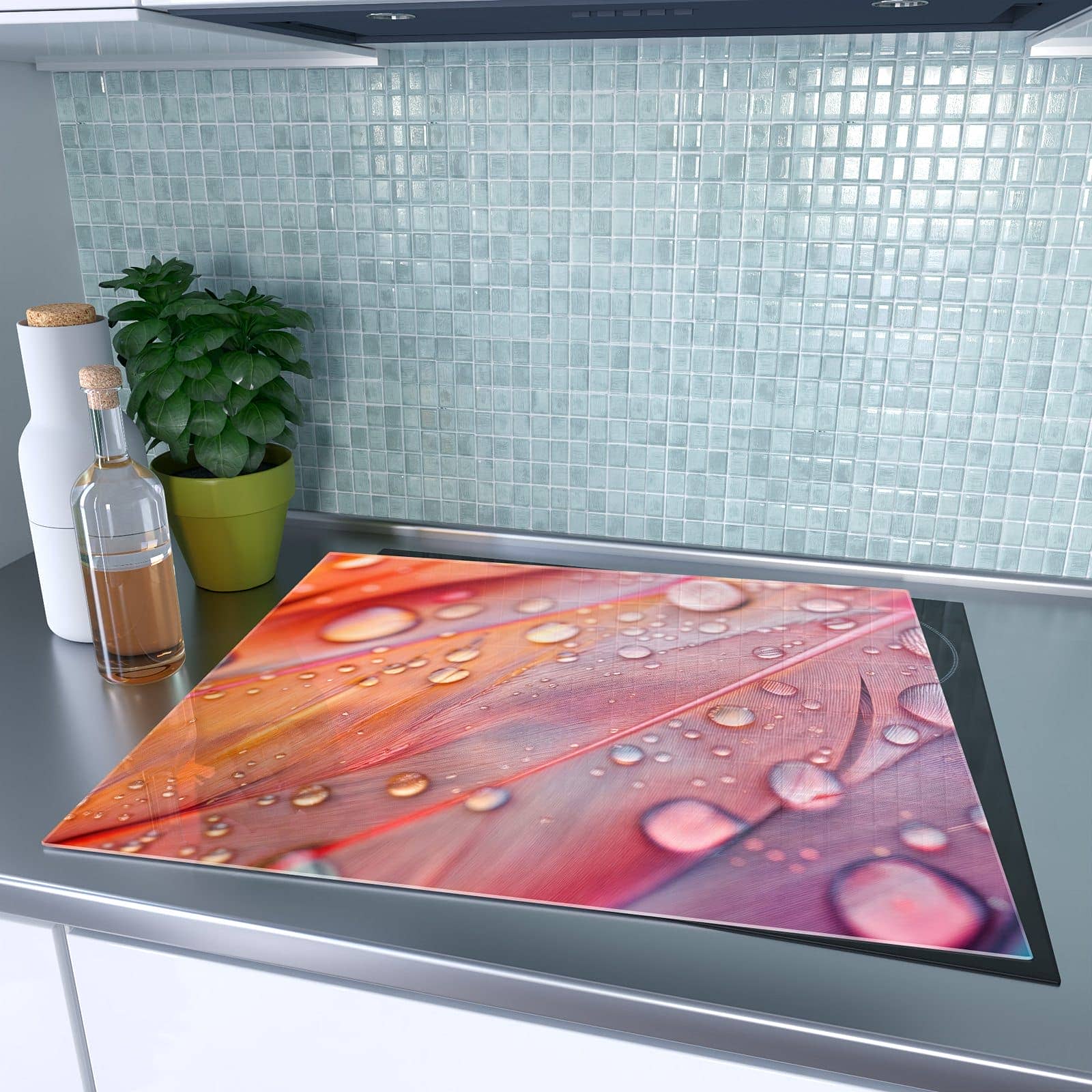 1-teilige Herdabdeckung für Induktionsfeld mit Wassertropfen auf Federn-Motiv auf dem Ceranfeld