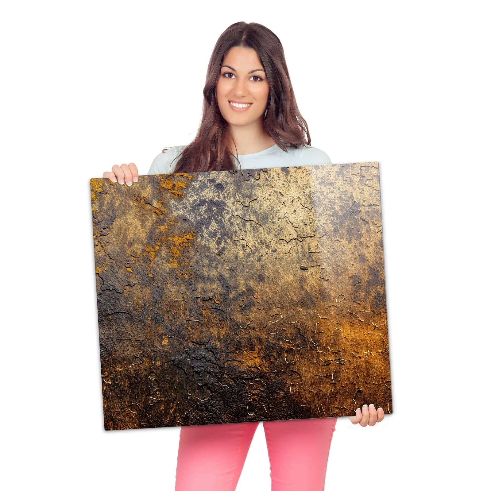 Glasplatte für Herd mit Golden Texture-Motiv wird zur Größendarstellung gehalten