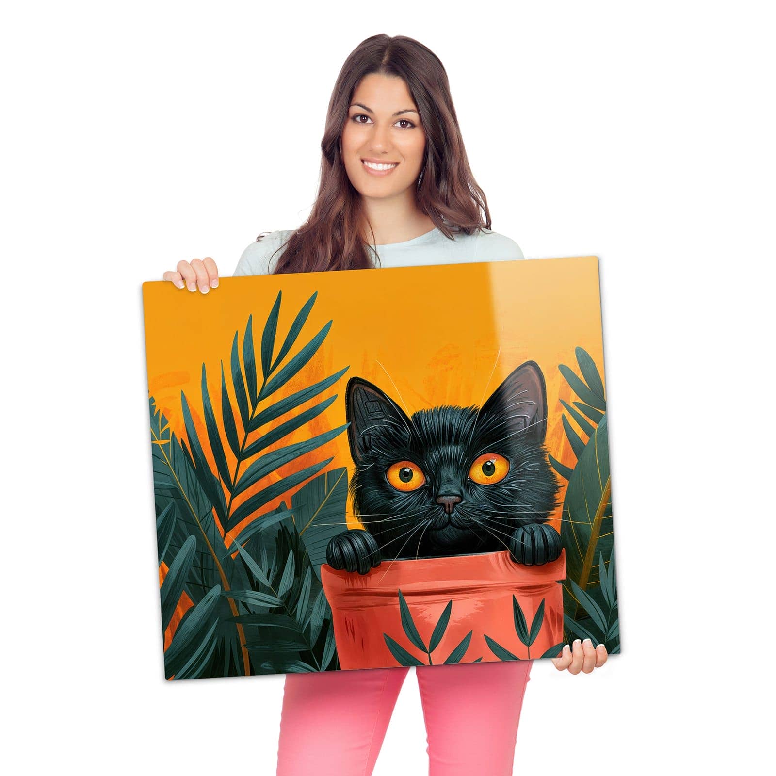 Herdabdeckplatte mit Katze im Dschungel-Motiv wird zur Größendarstellung gehalten