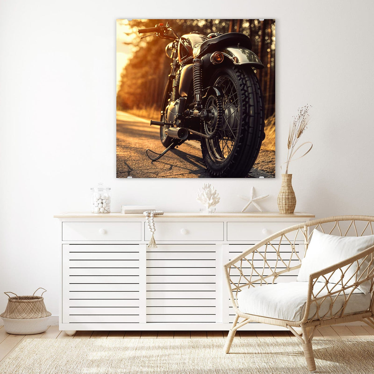 Glasbild Motorrad im Gegenlicht an der Wand – Klassisches Motorrad von schräg hinten auf Waldstraße, Sonne steht tief dahinter, goldenes Gegenlicht