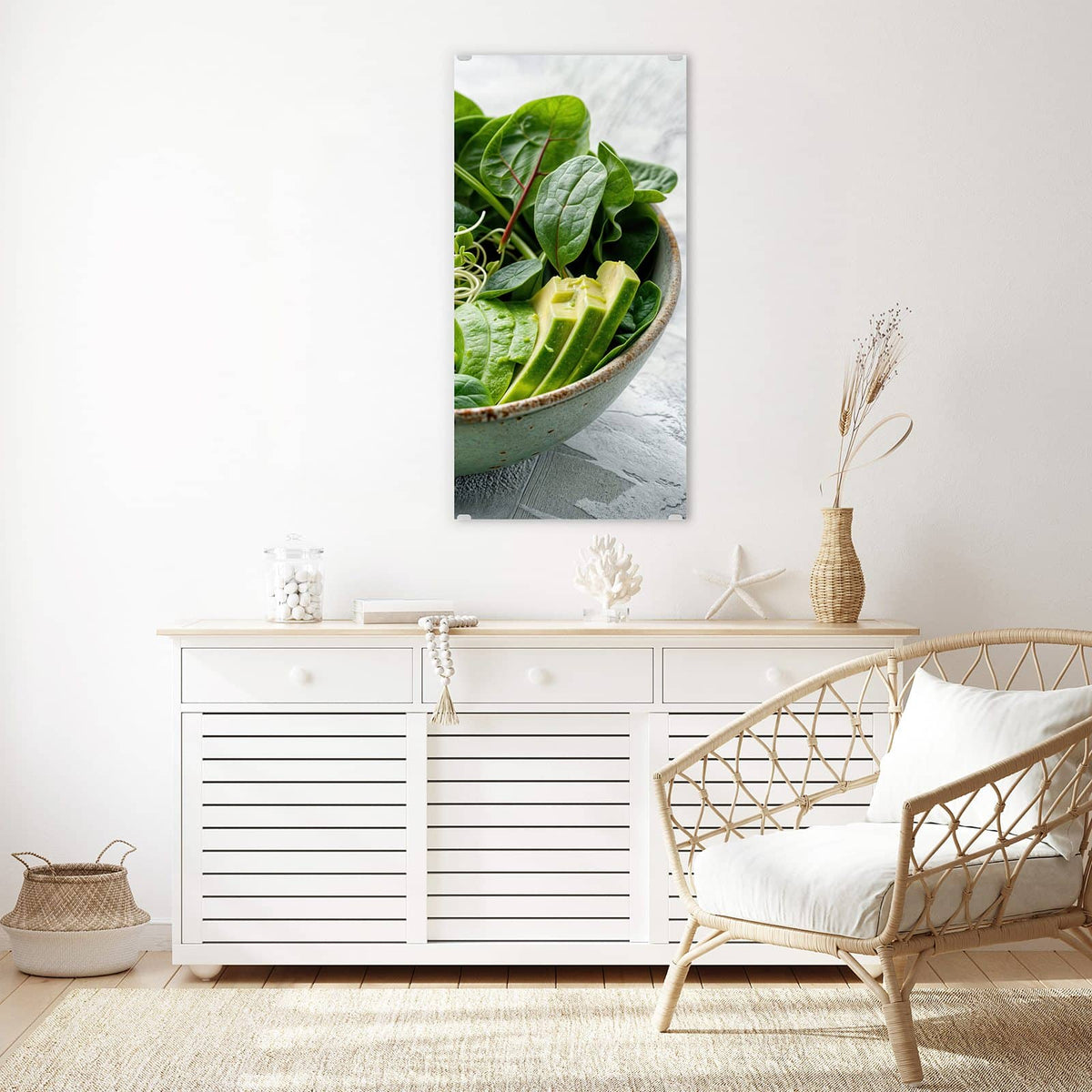 Glasbild Salat mit Avocado an der Wand – Grüne Schale mit Spinat, Gurke, Edamame, Radieschen und Sprossen, halbe Avocado und Limette daneben