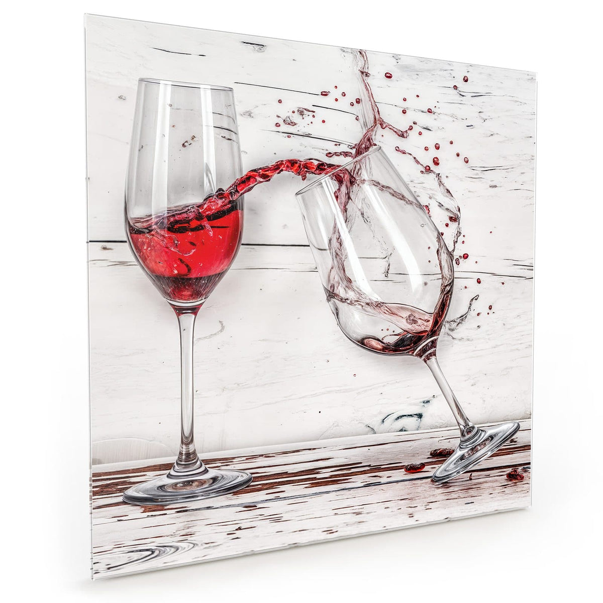 Küchenrückwand aus Glas im quadratischen Format mit Motiv Gekipptes Rotweinglas: Ein stehendes Glas mit Rotwein, ein zweites umgekippt #grösse_40 x 40 cm #grösse_50 x 50 cm #grösse_60 x 60 cm