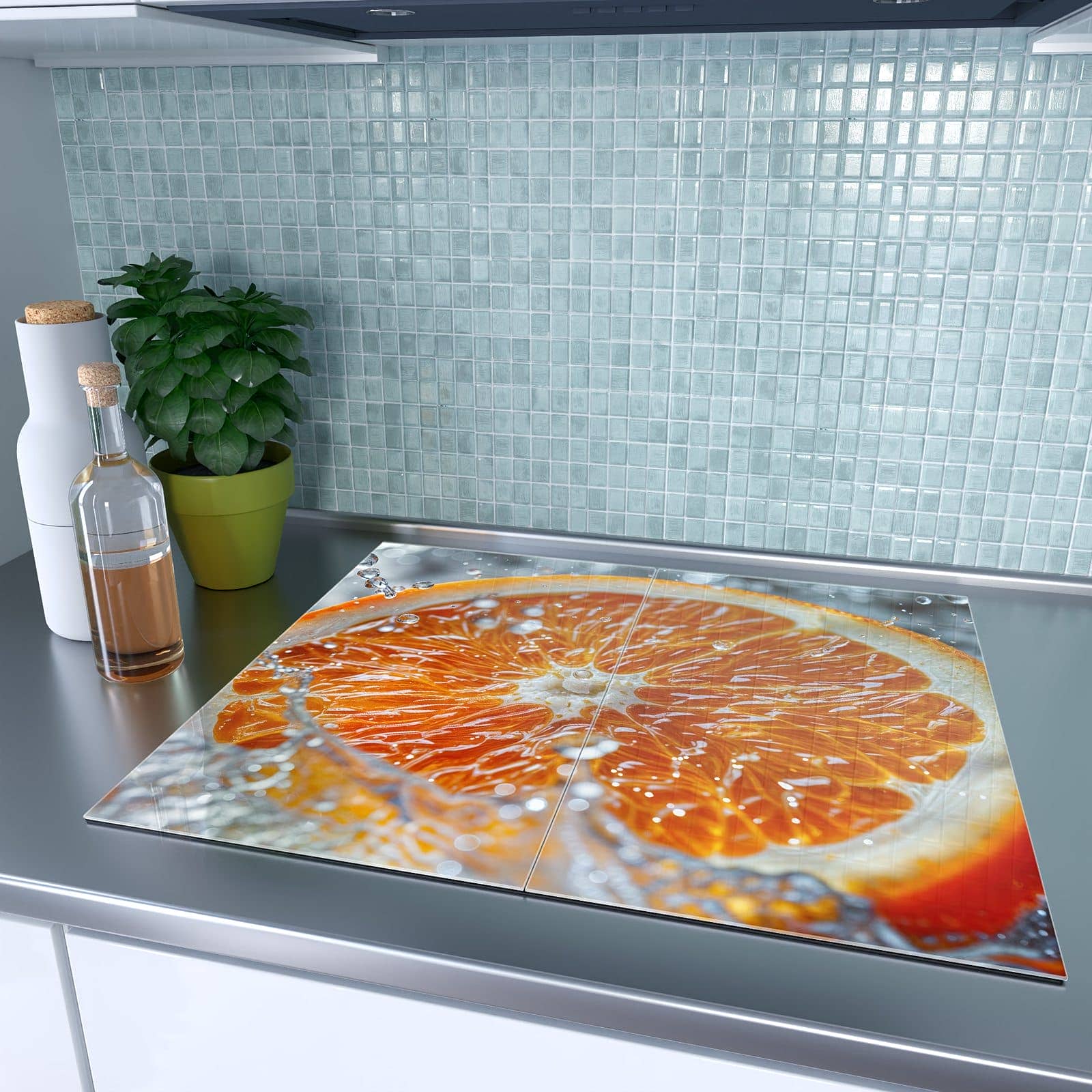 2-teilige Herdabdeckplatte aus Glas mit Orangenscheibe Spritz-Motiv auf dem Ceranfeld