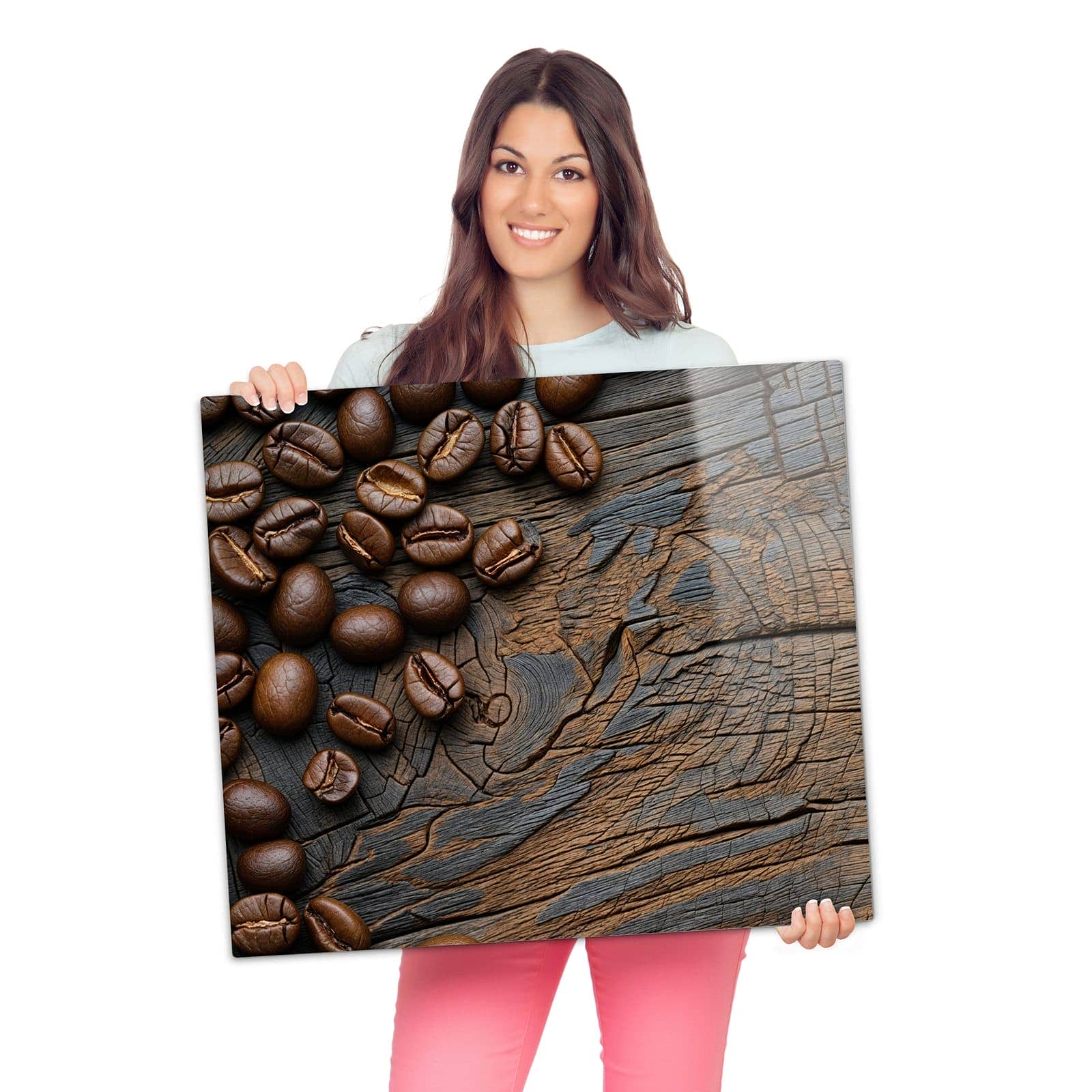 Herdabdeckplatte für Ceranfeld mit Kaffeebohnenholz-Motiv wird zur Größendarstellung gehalten