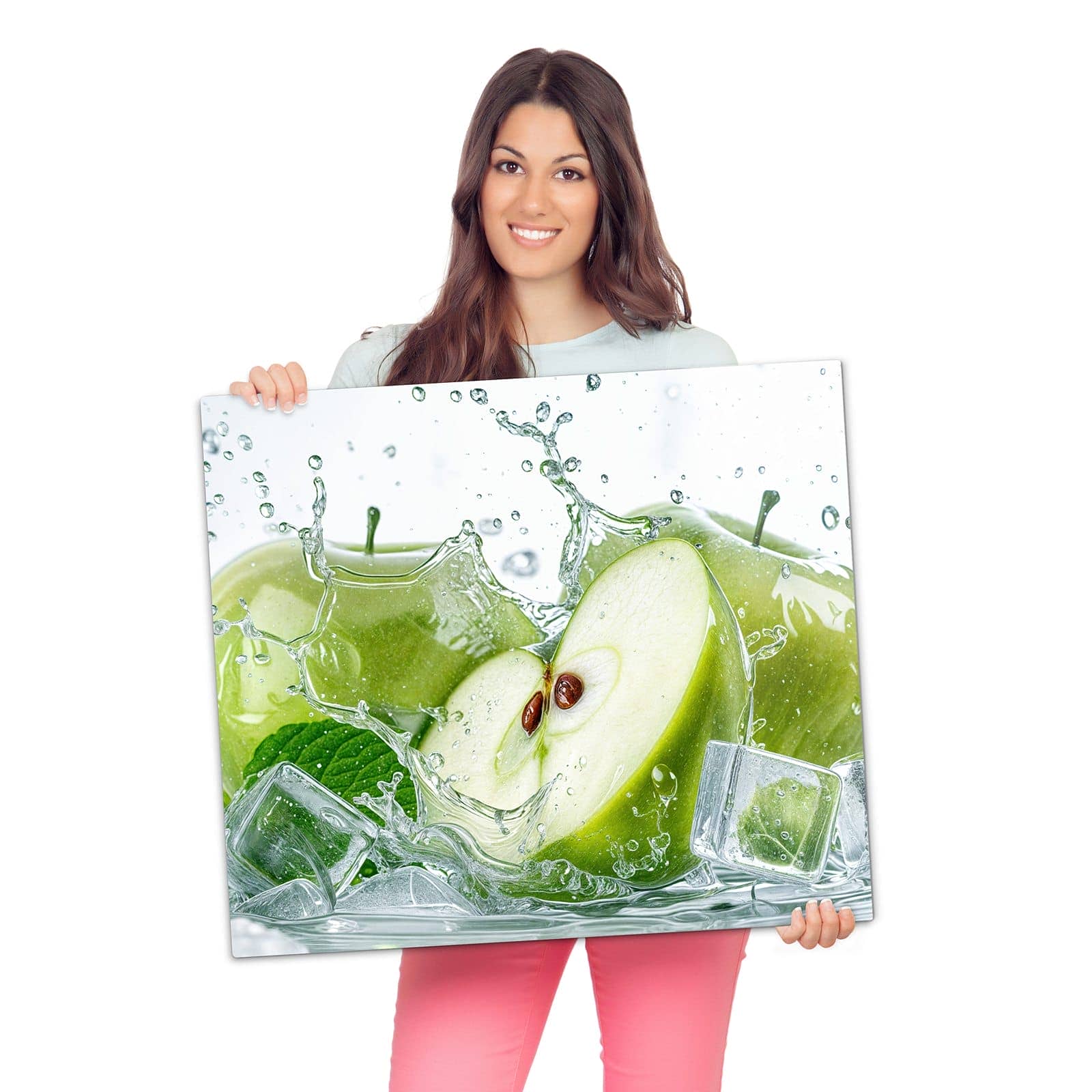 Herdabdeckplatte für Ceranfeld mit Frische Äpfel Splash-Motiv wird zur Größendarstellung gehalten