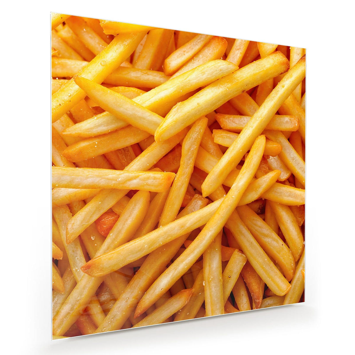 Bildfüllender Haufen goldgelber Pommes frites