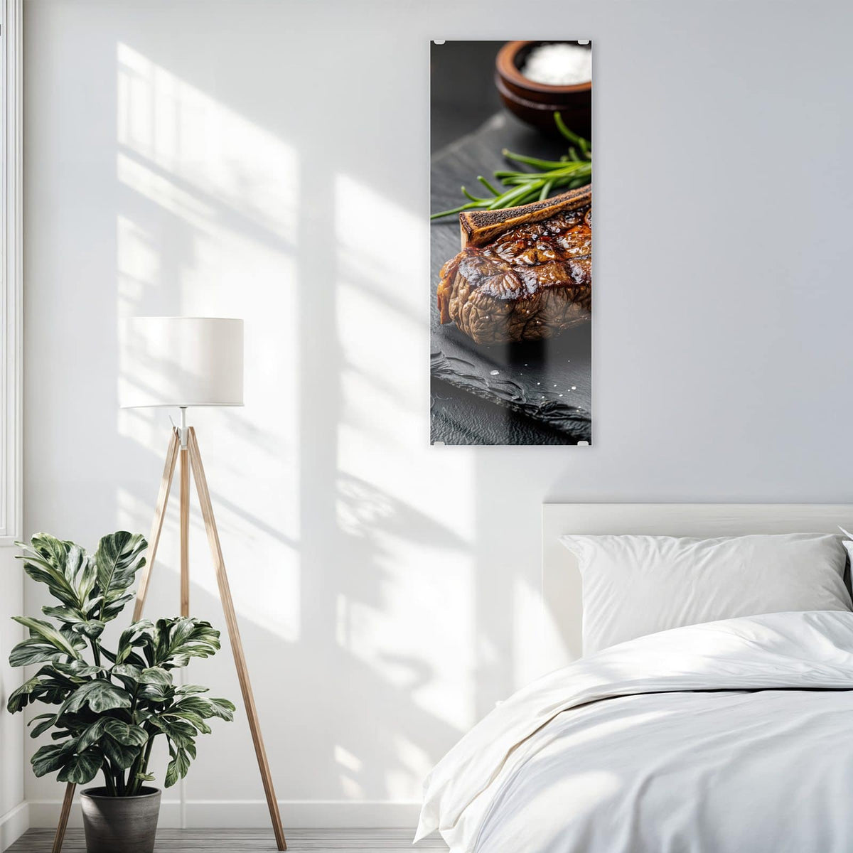 Glasbild T-Bone-Steak vom Grill an der Wand – Angeschnittenes T-Bone-Steak mit Grillstreifen auf Schiefer, dazu Rosmarin, Salzschale und Pfefferkörner
