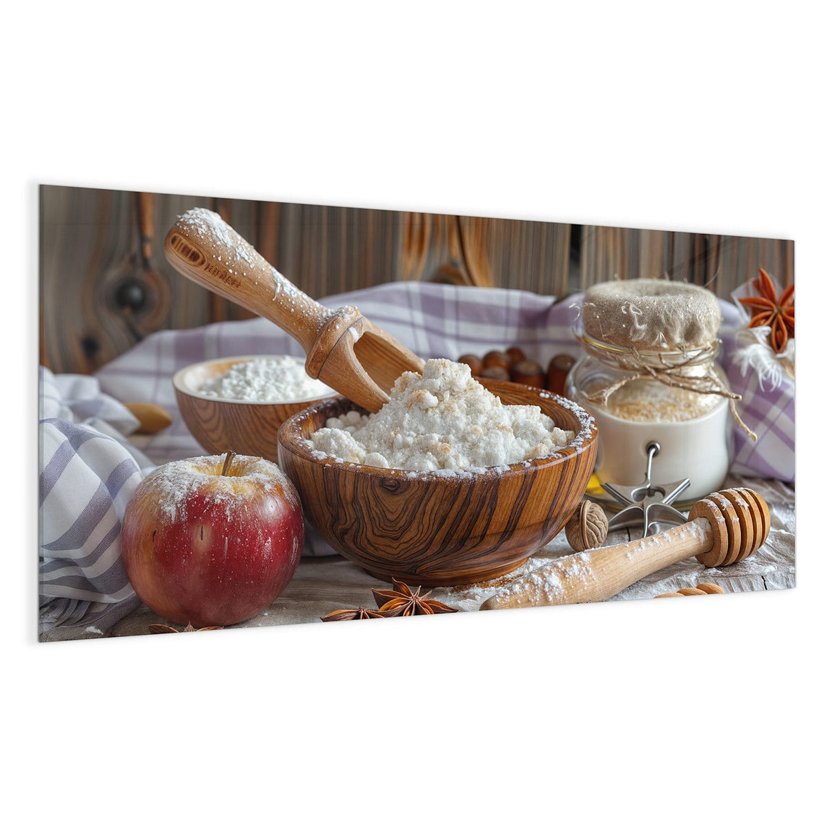 Holzschale mit Mehl, Nudelholz, roter Apfel, Sternanis und Vorratsgläser auf Holztisch