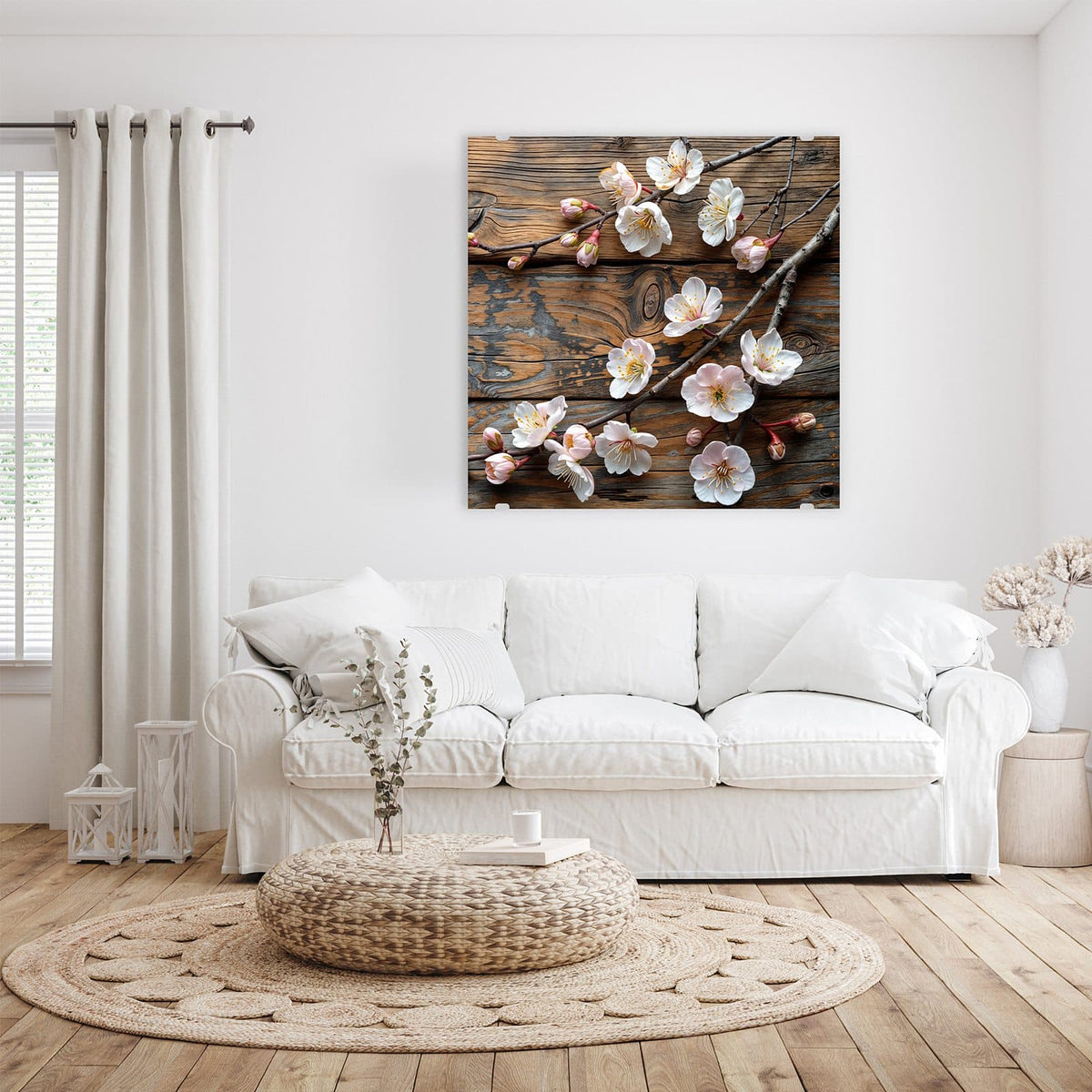Glasbild Kirschblüten auf Altholz an der Wand – Kirschblütenzweige liegen auf grob verwitterten, braun-grauen Holzbohlen