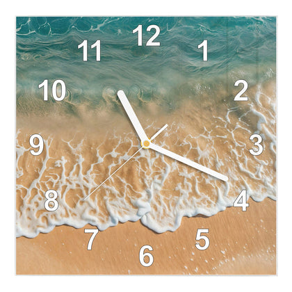 Wanduhr Quadratisch mit dem Motiv Meeresschaum auf Sand