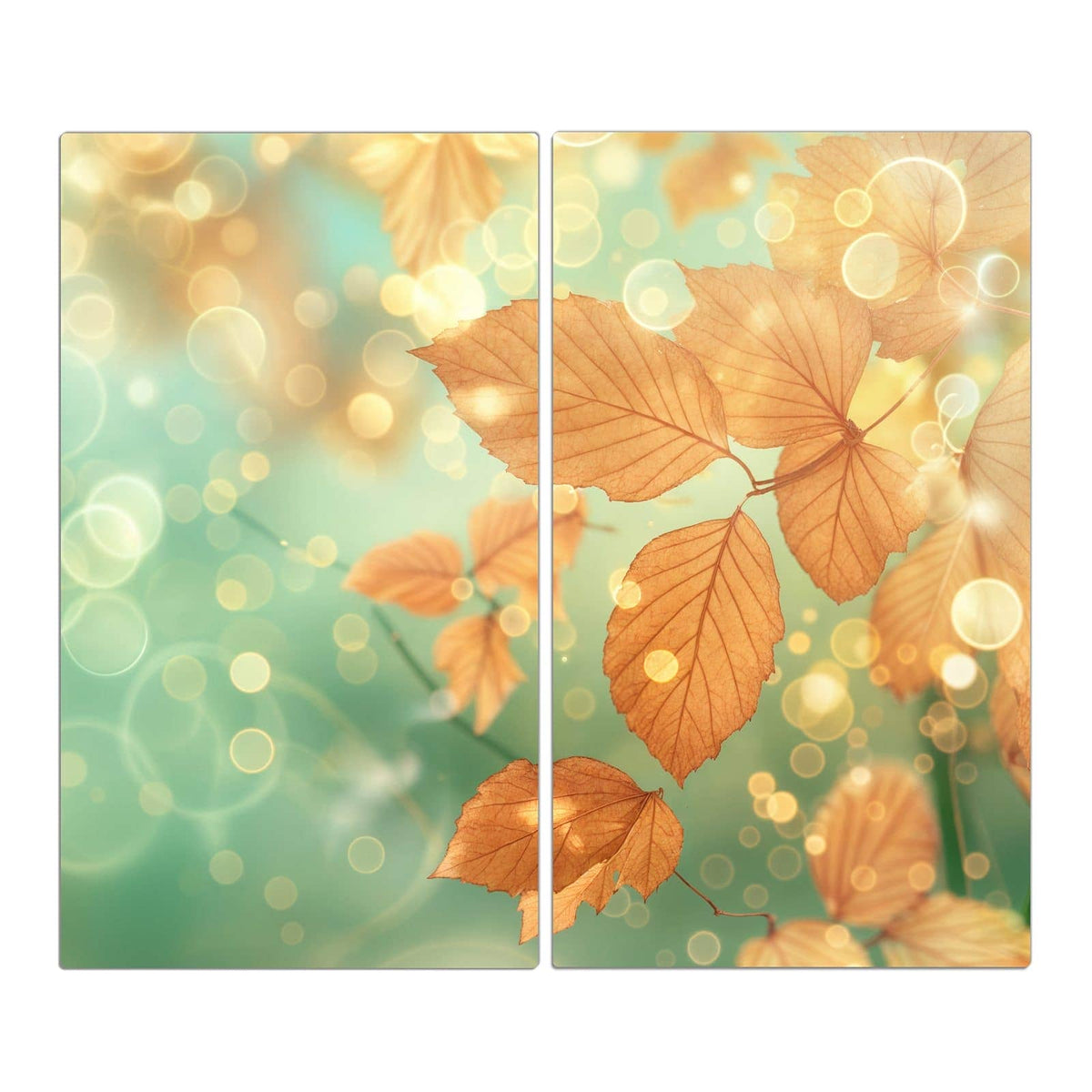 goldbraune Herbstblätter vor mintgrün-türkisem Bokeh