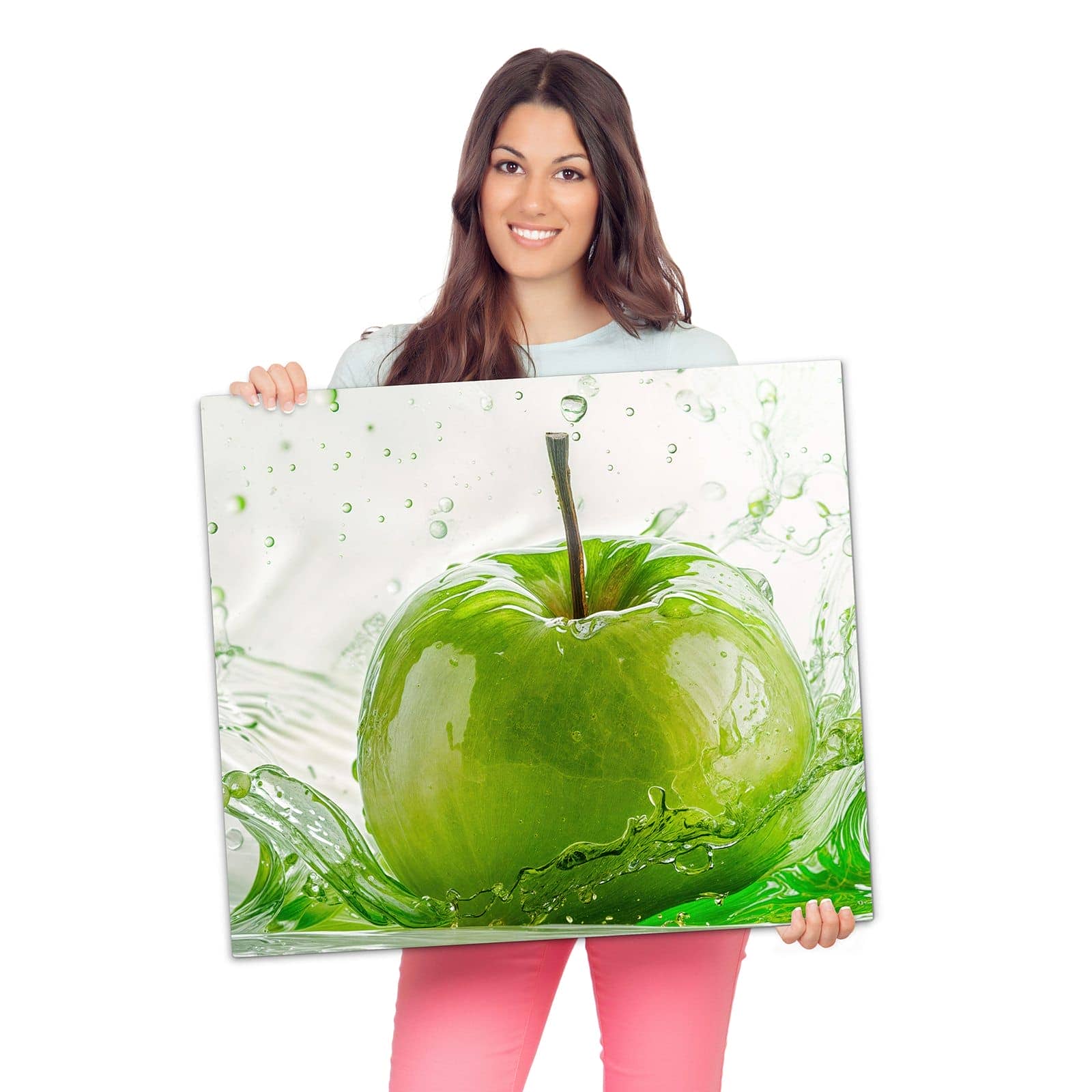 Herdabdeckplatte für Ceranfeld mit Apfel Spritzer-Motiv wird zur Größendarstellung gehalten