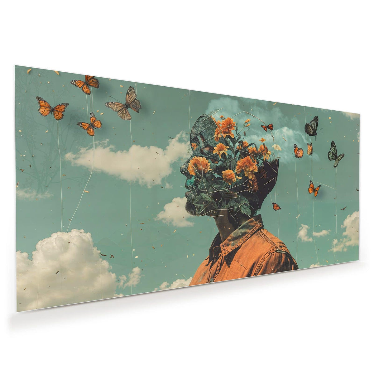 Retro-Collage: Kopf eines Mannes, gefüllt mit orangen Blüten, davor Schmetterlinge an Fäden vor türkisem Wolkenhimmel.