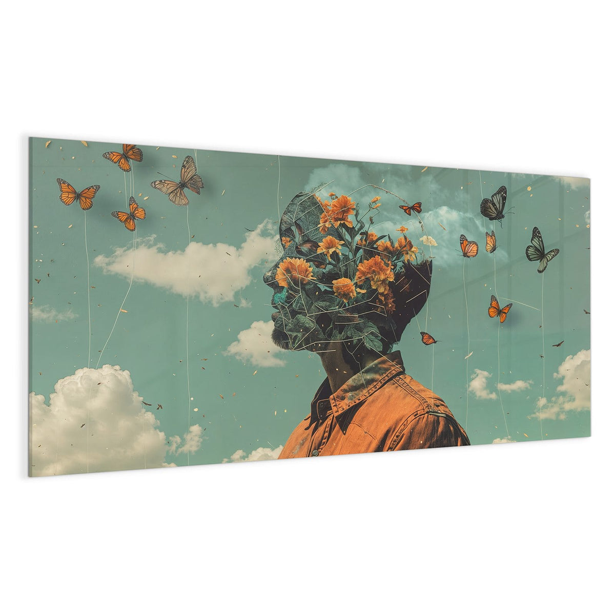 Retro-Collage: Kopf eines Mannes, gefüllt mit orangen Blüten, davor Schmetterlinge an Fäden vor türkisem Wolkenhimmel.