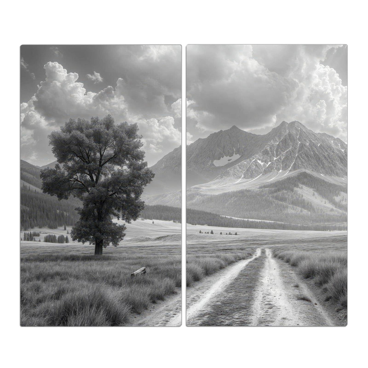 Schwarzweißfoto: einzelner Baum links an einem Feldweg, dahinter Bergkette mit Wolkentürmen.