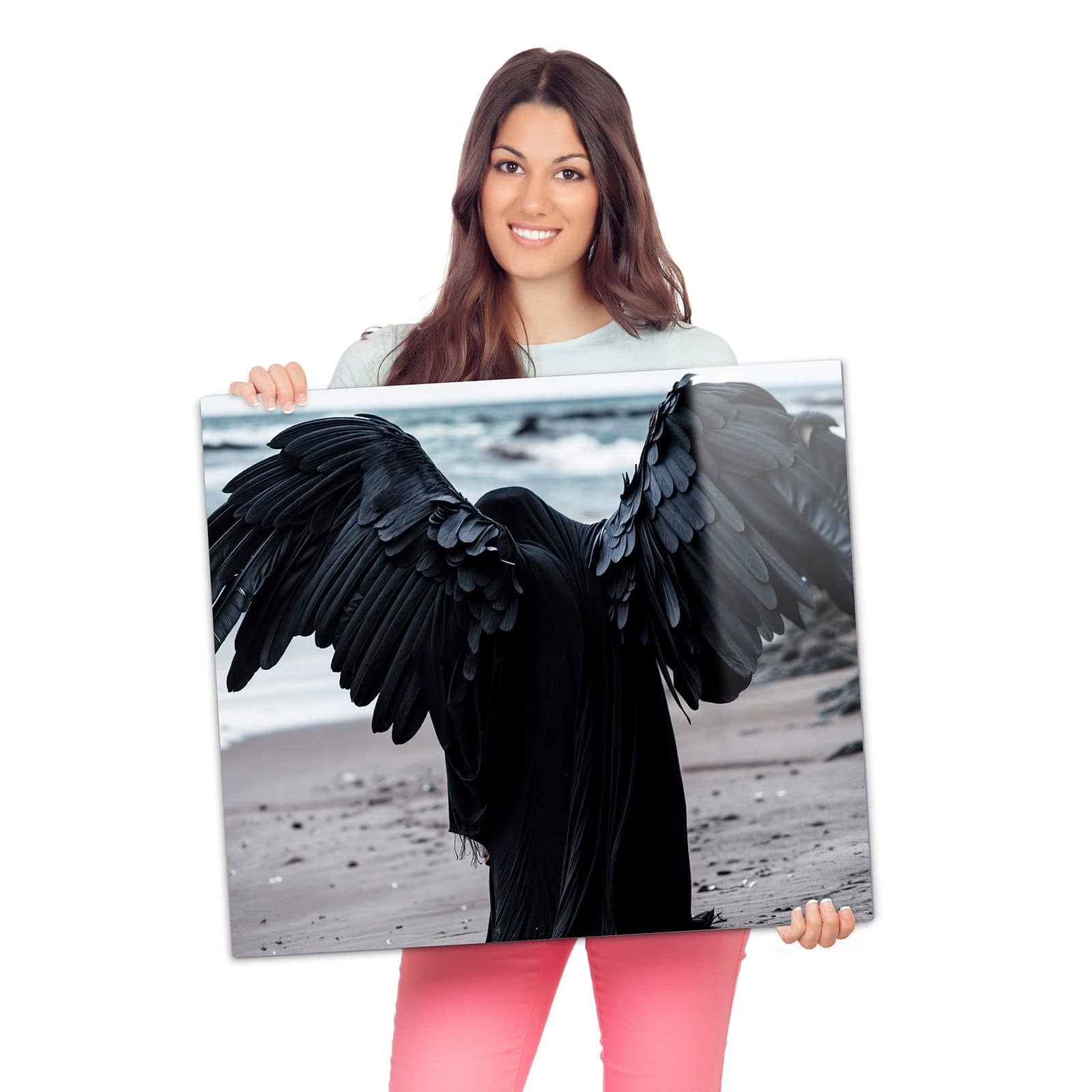 Herdabdeckplatte aus Glas mit Geflügelter Wanderer-Motiv wird zur Größendarstellung gehalten