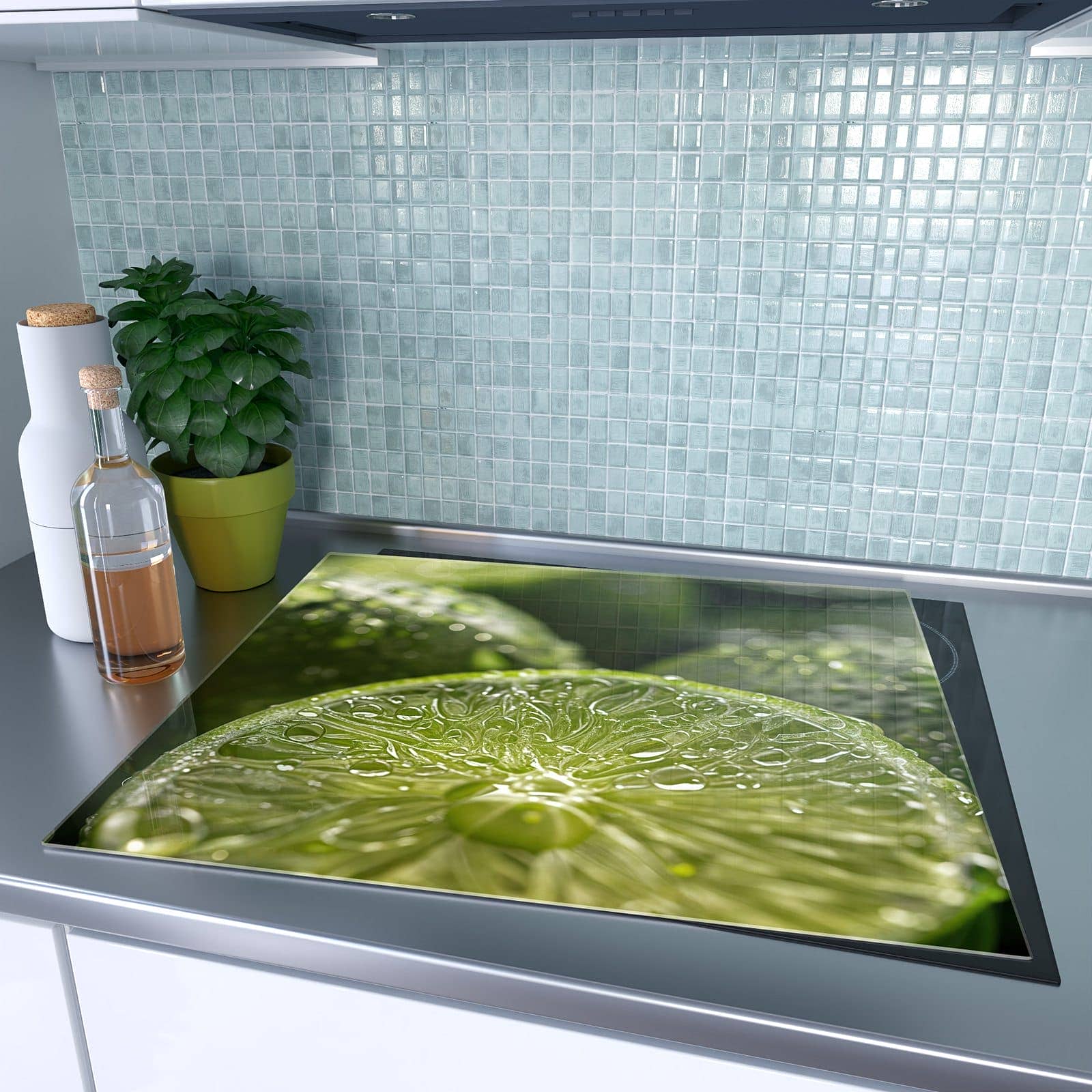 1-teilige Kochfeldabdeckung mit Limetten mit Wassertropfen-Motiv auf dem Ceranfeld
