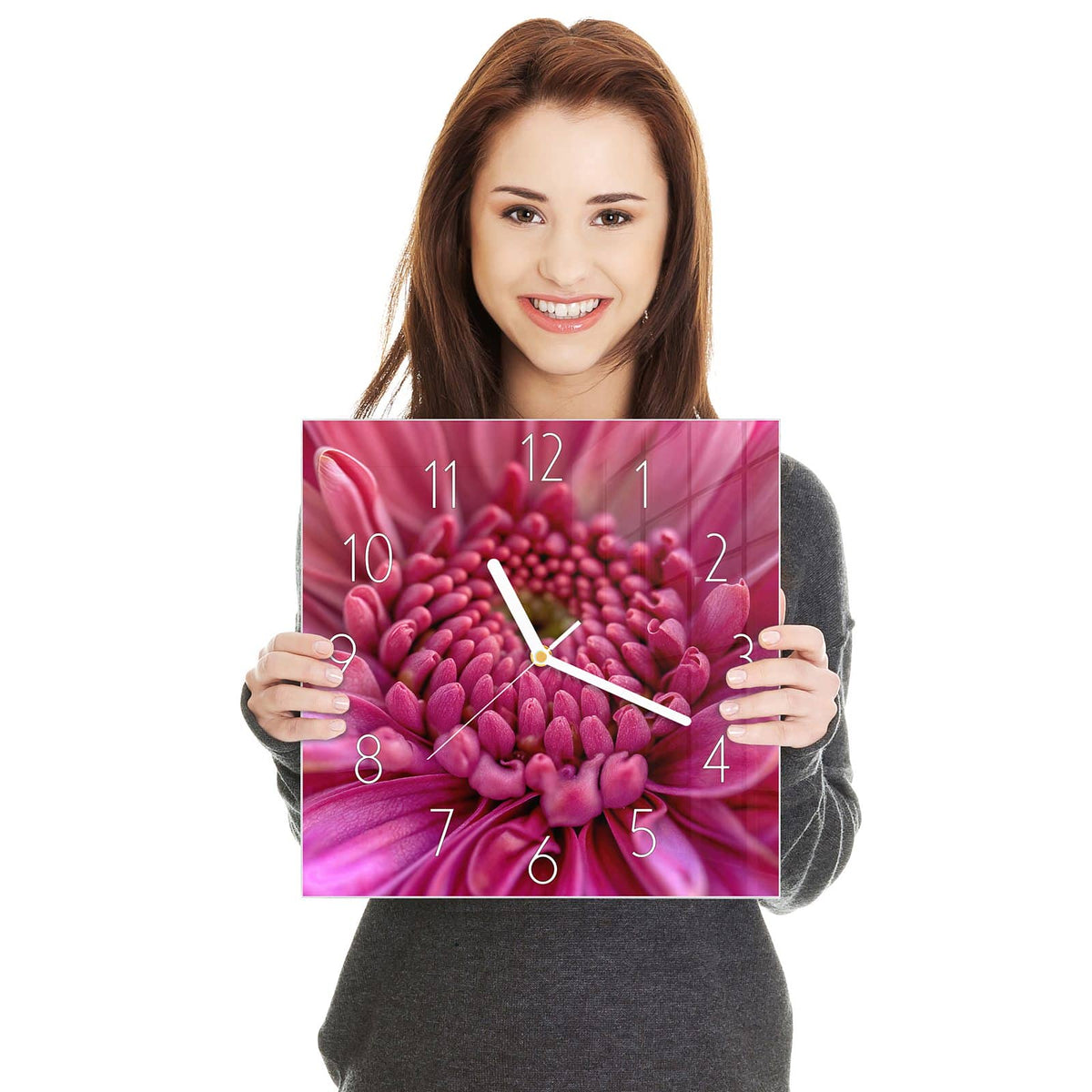 Makro einer pinken Blüte, deren Knospenzentrum sich spiralig anordnet.
