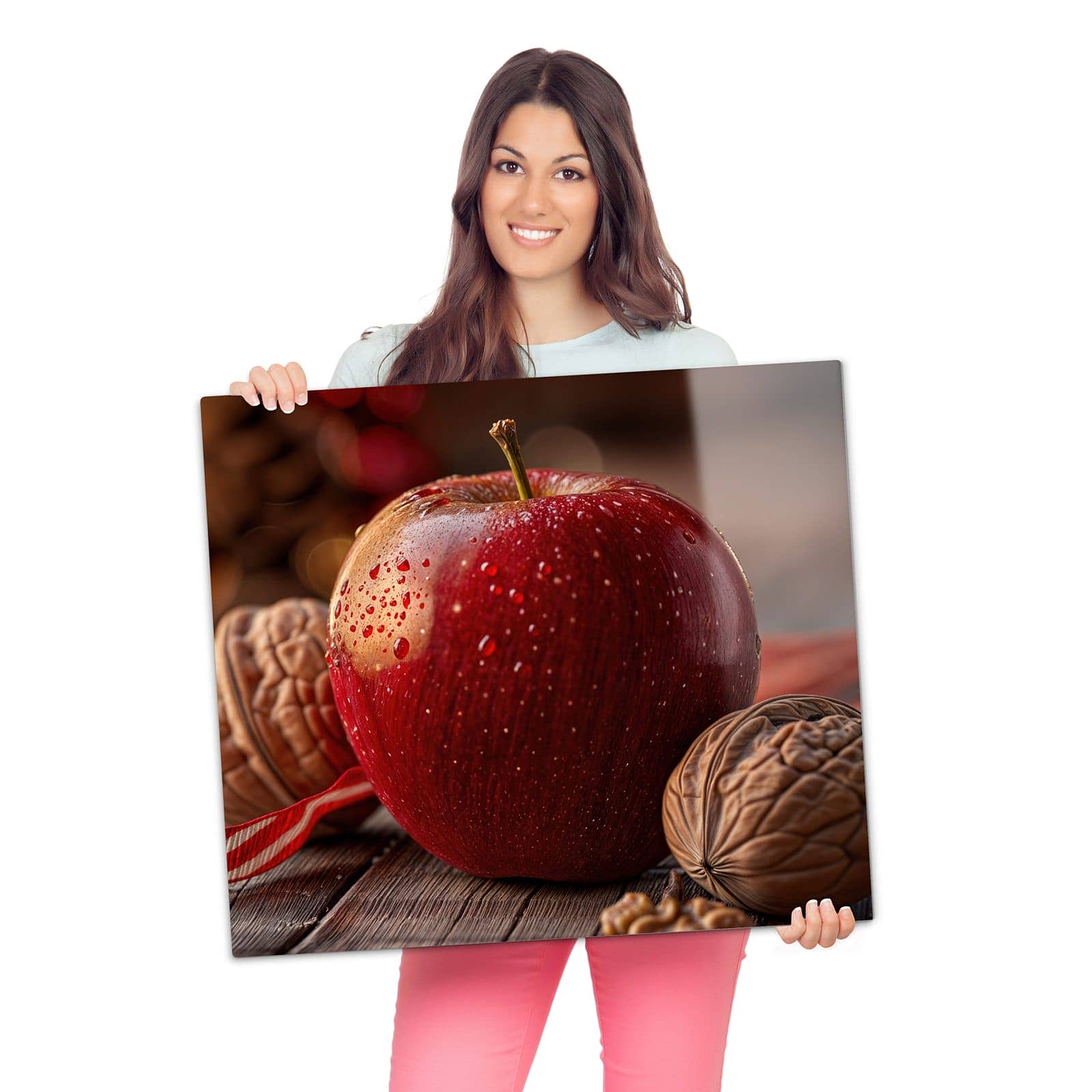 Abdeckung für Herdplatten mit Apfel und Nüsse-Motiv wird zur Größendarstellung gehalten