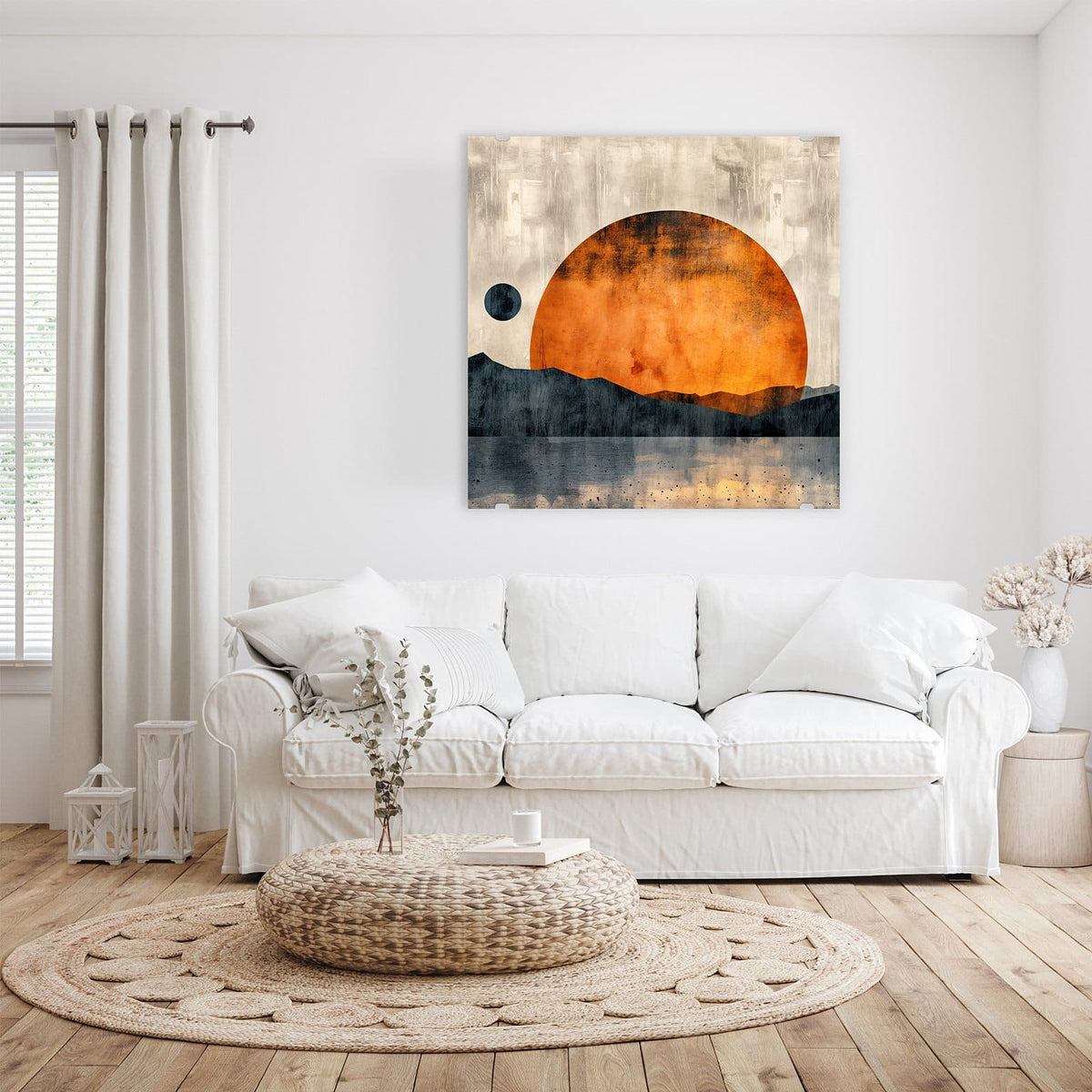 Glasbild Orange Sonne über Bergen an der Wand – Große orange Sonnenscheibe über dunkelblauen Bergsilhouetten und Wasser, links ein kleiner dunkler Mond.