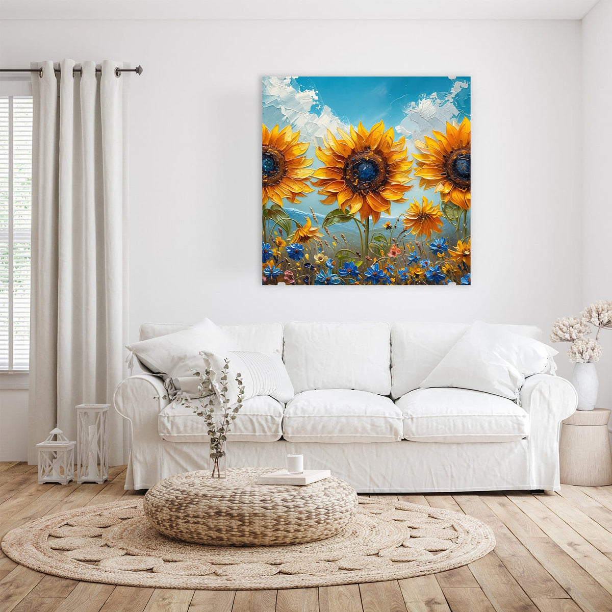 Glasbild Sonnenblumenwiese an der Wand – Pastos gemalte Sonnenblumen über einer Wiese mit blauen Kornblumen unter blauem Himmel