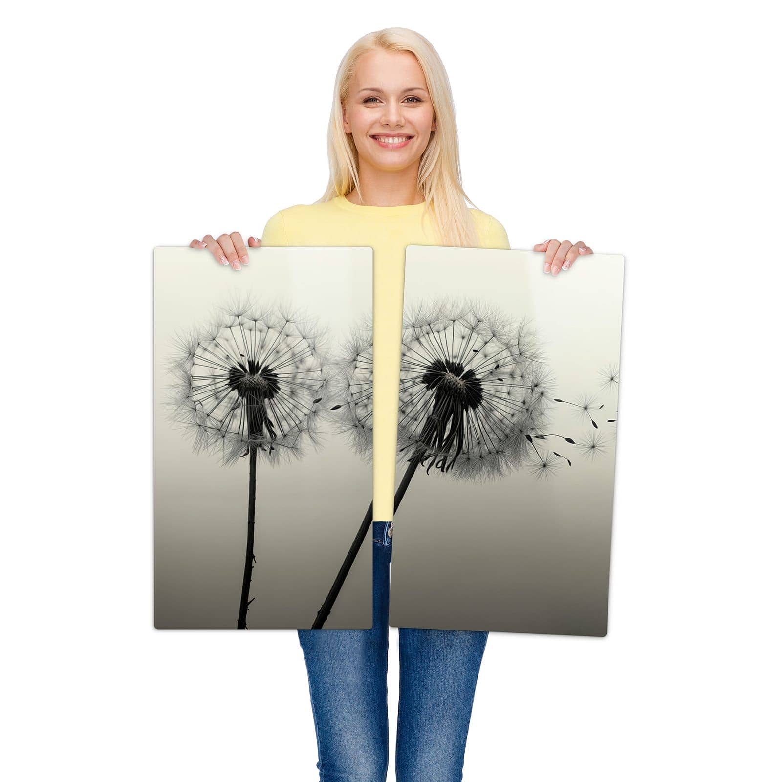 2-teilige Glasabdeckplatte für Ceranfeld mit Pusteblume Schwarz-Motiv wird zur Größendarstellung gehalten