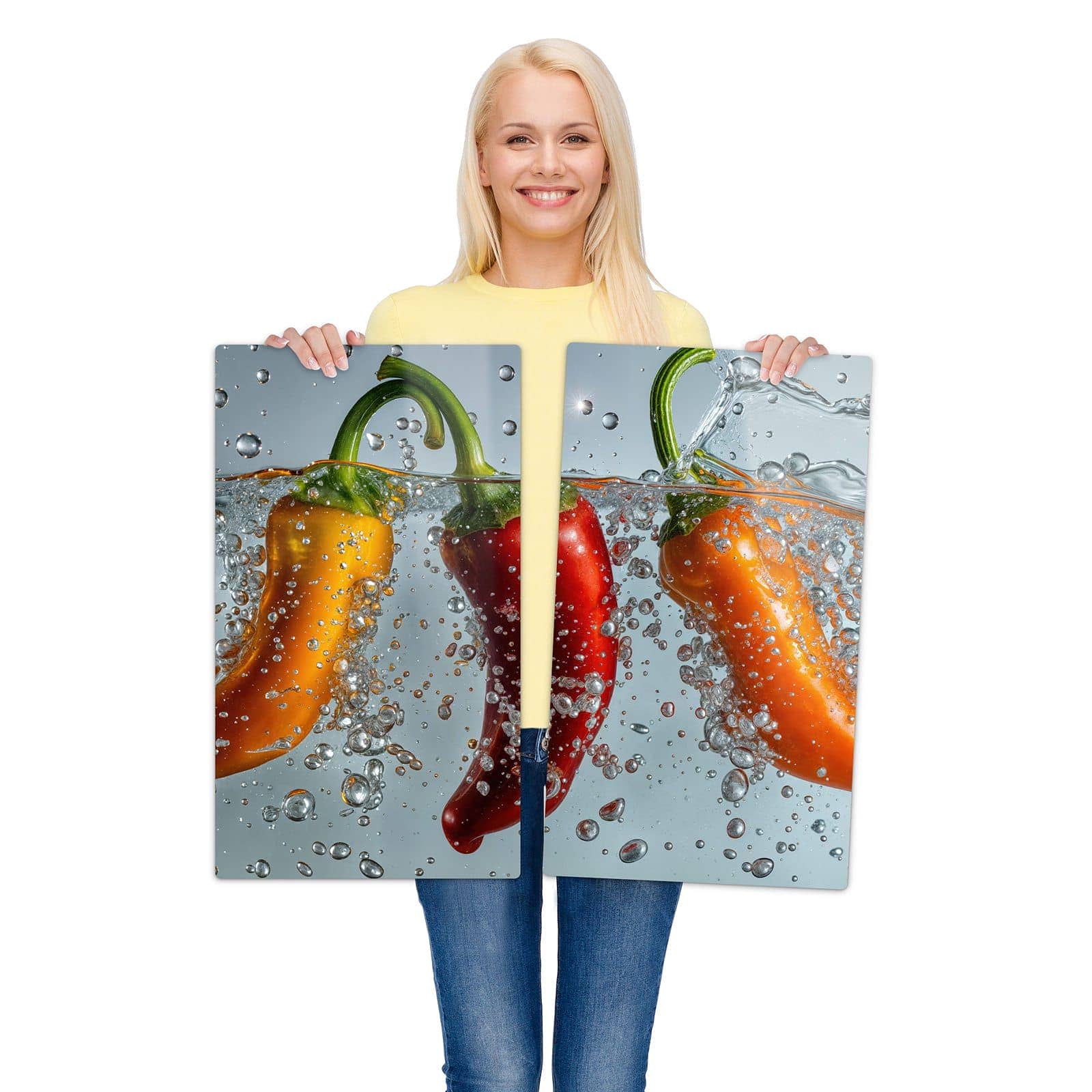 2-teilige Glasabdeckplatte für Ceranfeld mit Spritzige Paprika-Motiv wird zur Größendarstellung gehalten