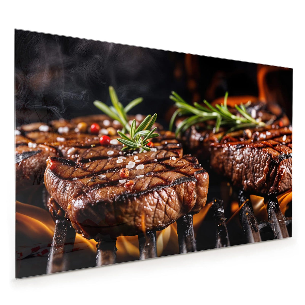 Küchenrückwand aus Glas im Hochformat: Zwei Steaks mit Rosmarin auf dem Grillrost, Flammen schlagen darunter hervor