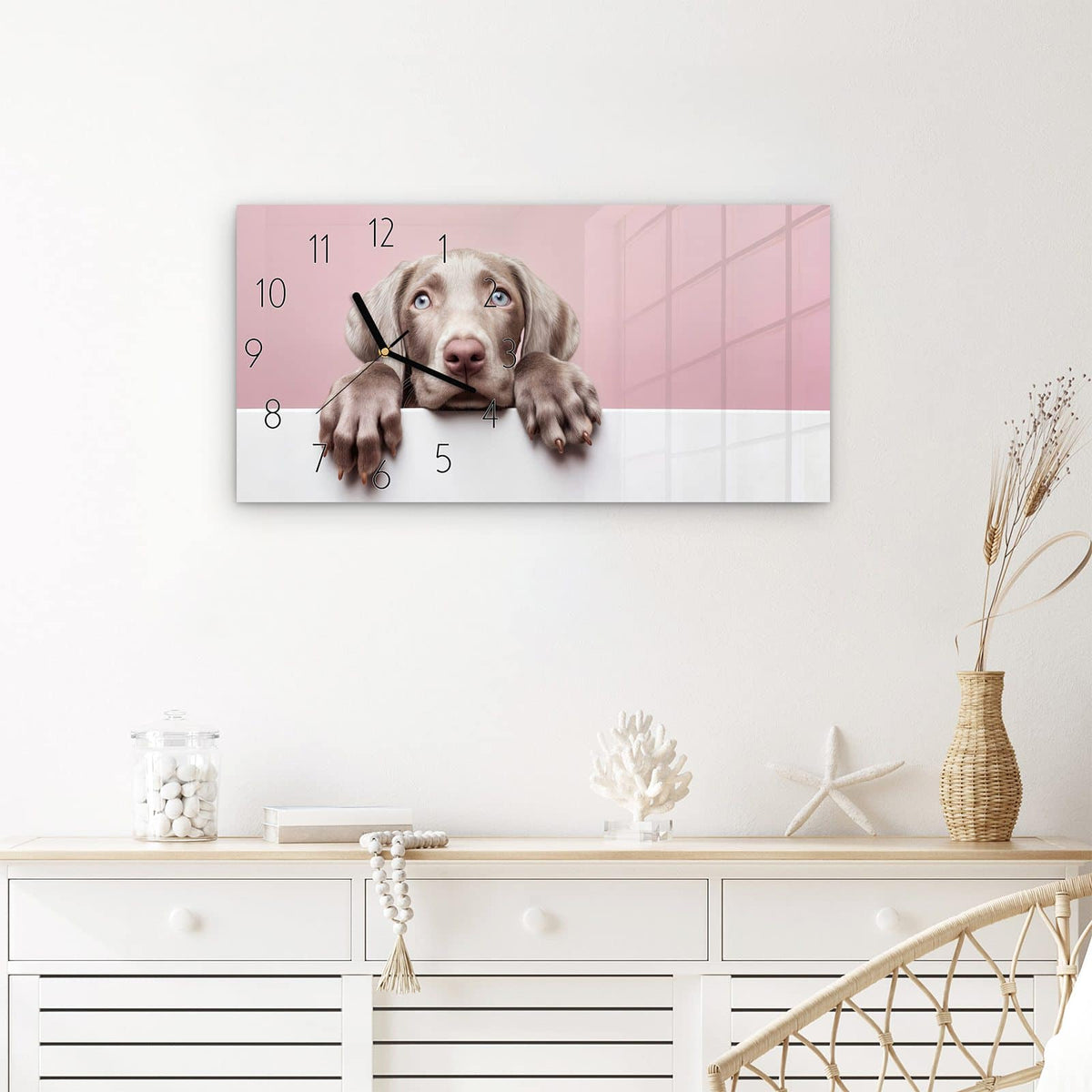 Wanduhr Niedlicher Welpe aus Glas – Querformat 60 × 30 cm – Welpe mit blauen Augen vor Rosa